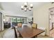 Spacious dining area with a view of the living room and kitchen at 36750 Us Highway 19 N # 05102, Palm Harbor, FL 34684