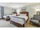 Bedroom with two twin beds, and a sitting chair at 36750 Us Highway 19 N # 05102, Palm Harbor, FL 34684