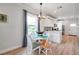 Charming dining area with a white table and four chairs at 222 Hope St, Tarpon Springs, FL 34689