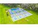 Several well-maintained pickleball courts at 5802 Cheyenne St, Zephyrhills, FL 33542