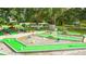Community mini golf course with whimsical decor at 5802 Cheyenne St, Zephyrhills, FL 33542