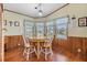 Small dining area with wooden table and chairs at 5802 Cheyenne St, Zephyrhills, FL 33542