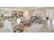 Open-concept living room, kitchen, and dining area at 16044 7Th E Ave, Bradenton, FL 34212