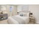 Spacious bedroom with a queen-size bed and modern decor at 16044 7Th E Ave, Bradenton, FL 34212