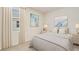 Bright bedroom with a comfortable bed and stylish decor at 16044 7Th E Ave, Bradenton, FL 34212