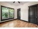 Bright bedroom with wood flooring and a ceiling fan at 2111 Burlington N Ave, St Petersburg, FL 33713