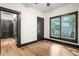 Bright bedroom with wood floors and updated doors at 2111 Burlington N Ave, St Petersburg, FL 33713