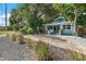 Charming bungalow with landscaped yard and walkway at 2111 Burlington N Ave, St Petersburg, FL 33713