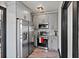 Modern kitchen with stainless steel appliances and granite countertops at 2111 Burlington N Ave, St Petersburg, FL 33713