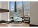 Sunlit corner with patterned chair and side table at 2111 Burlington N Ave, St Petersburg, FL 33713