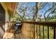 Private deck with wooded views and grill at 1900 Whispering Way, Tarpon Springs, FL 34689