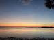 Stunning sunset view over calm waterfront at 4851 W Gandy Blvd # B11L35, Tampa, FL 33611