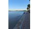 Brick-paved waterfront walkway and calm water views at 4851 W Gandy Blvd # B11L35, Tampa, FL 33611
