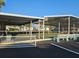 Outdoor shuffleboard courts with covered seating areas at 4851 W Gandy Blvd # B11L35, Tampa, FL 33611