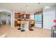 Modern kitchen with granite countertop and stainless steel appliances at 1307 Pasadena Bloom Ln, Ruskin, FL 33570
