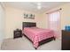 Comfortable bedroom with a queen-size bed and calming decor at 1307 Pasadena Bloom Ln, Ruskin, FL 33570