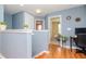 Upstairs hallway with home office and access to bedrooms and bathroom at 1307 Pasadena Bloom Ln, Ruskin, FL 33570