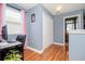 Home office with wood flooring and built in closet at 1307 Pasadena Bloom Ln, Ruskin, FL 33570