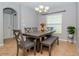 Dining room with table, bench, and chairs, offering ample space at 1307 Pasadena Bloom Ln, Ruskin, FL 33570