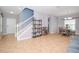 Open living room with tile floors and a dining area at 1307 Pasadena Bloom Ln, Ruskin, FL 33570