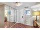 Entryway with mirrored walls and tile floor at 660 Island Way # 506, Clearwater Beach, FL 33767