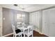 Bright dining area with a round table and chairs, perfect for entertaining at 660 Island Way # 506, Clearwater Beach, FL 33767