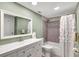 Updated bathroom with a tub and a white vanity at 660 Island Way # 506, Clearwater Beach, FL 33767