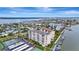 High-rise building with tennis courts and marina at 660 Island Way # 506, Clearwater Beach, FL 33767