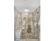 Spa-like bathroom with a large walk-in shower and pebble tile at 660 Island Way # 506, Clearwater Beach, FL 33767