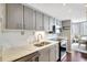 Updated kitchen featuring stainless steel appliances and white quartz countertops at 660 Island Way # 506, Clearwater Beach, FL 33767