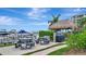 Relaxing waterfront patio area with picnic tables and grill at 660 Island Way # 506, Clearwater Beach, FL 33767