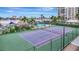 Tennis court with pool and waterfront views at 660 Island Way # 506, Clearwater Beach, FL 33767