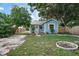 Charming home with fenced backyard and fire pit at 2111 Burlington N Ave, St Petersburg, FL 33713