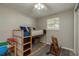' room with a unique bunk bed featuring built-in storage and a charming rocking horse at 12318 Woodleigh Ave, Tampa, FL 33612