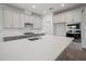 Bright kitchen with granite countertops, stainless steel appliances, and plentiful cabinet storage at 6218 Hidden Branch, Apollo Beach, FL 33572