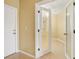 Entryway with frosted glass doors leading to other rooms at 1200 Country Club Dr # 1503, Largo, FL 33771