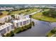 Condo community near golf course with water views, highlighted building shown at 1200 Country Club Dr # 1503, Largo, FL 33771