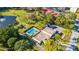Aerial view of community pool and clubhouse at 5521 80Th N St # 310, St Petersburg, FL 33709