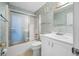 Clean bathroom with shower/tub combo and vanity at 5521 80Th N St # 310, St Petersburg, FL 33709
