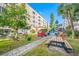 Community picnic area with grill and seating at 5521 80Th N St # 310, St Petersburg, FL 33709
