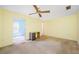 Spacious bedroom with ceiling fan and ample closet space at 5521 80Th N St # 310, St Petersburg, FL 33709