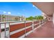 View from balcony overlooking building and parking at 5521 80Th N St # 310, St Petersburg, FL 33709