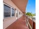 Exterior view of building showing walkway and windows at 5521 80Th N St # 310, St Petersburg, FL 33709