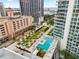 Aerial view of resort-style pool and sundeck with city views at 175 1St S St # 406, St Petersburg, FL 33701