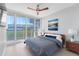 Main bedroom with king bed and access to balcony at 175 1St S St # 406, St Petersburg, FL 33701