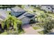 Two-story house with a gray roof and brick driveway at 19501 Sea Myrtle Way, Tampa, FL 33647