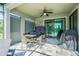 Covered patio with table and chairs, great for outdoor dining at 19501 Sea Myrtle Way, Tampa, FL 33647