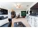 Versatile bonus room with a workspace and entertainment area at 19501 Sea Myrtle Way, Tampa, FL 33647