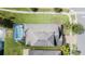 Overhead view of a house with a pool and screened enclosure at 19501 Sea Myrtle Way, Tampa, FL 33647