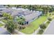 Home's back exterior with pool and screened enclosure at 19501 Sea Myrtle Way, Tampa, FL 33647